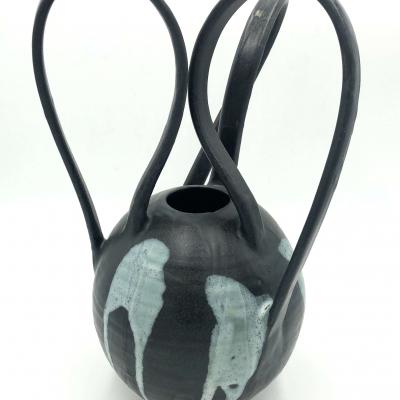 vase en mouvement noir